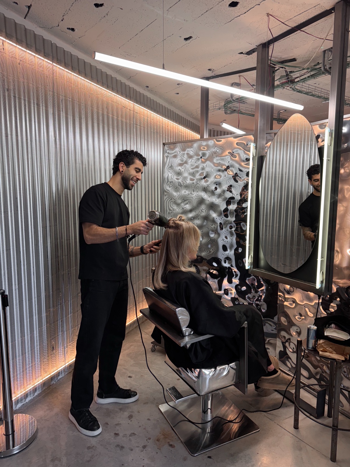 Stylist at work at Garage Hair Club, Marbella